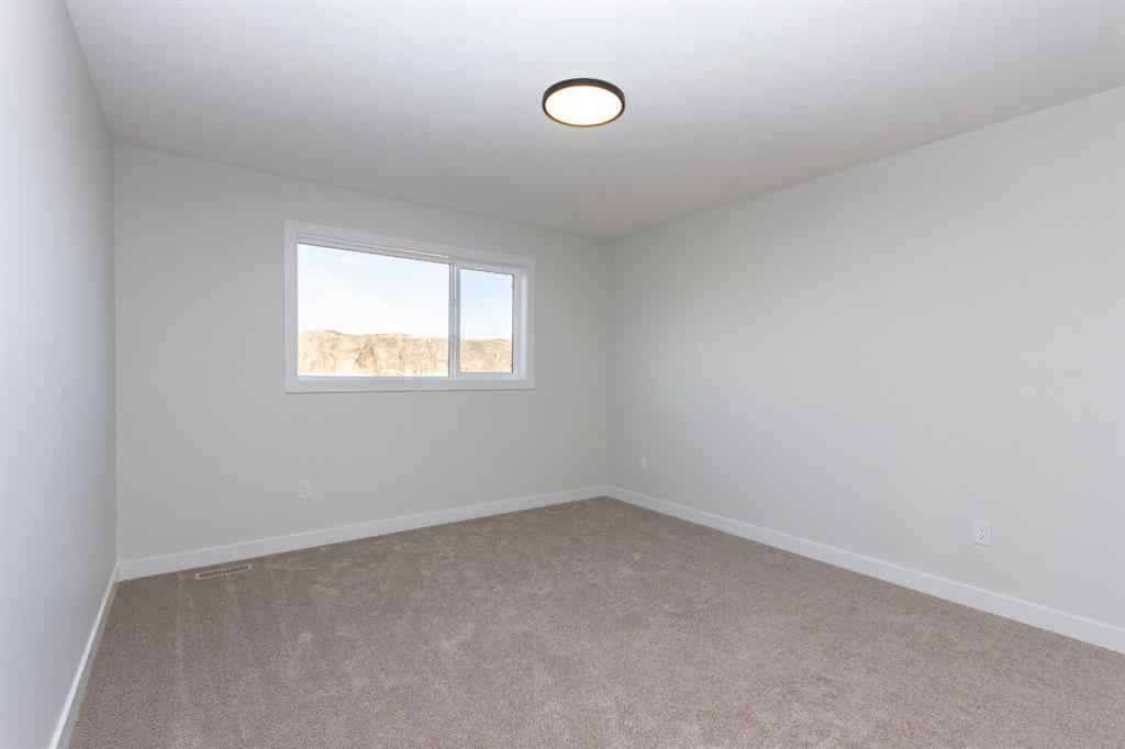MLS® A2230958 - 52 Trinity Street  in Trinity Crossing Lacombe, Residential