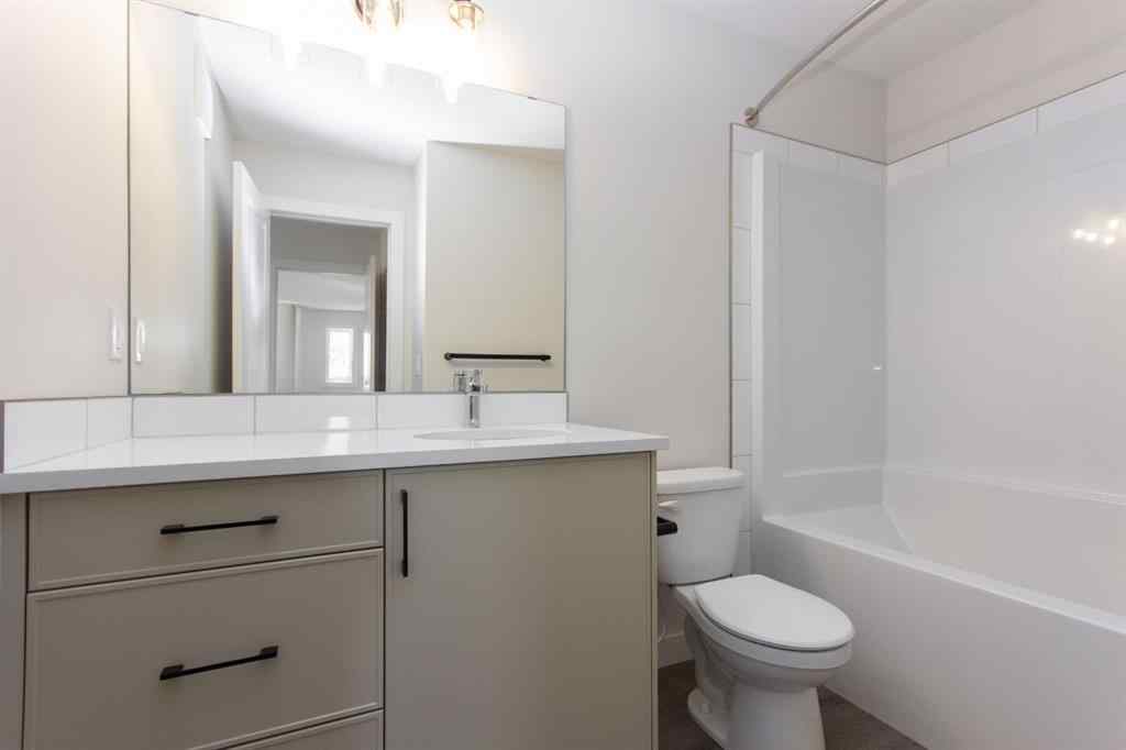 MLS® A2230958 - 52 Trinity Street  in Trinity Crossing Lacombe, Residential