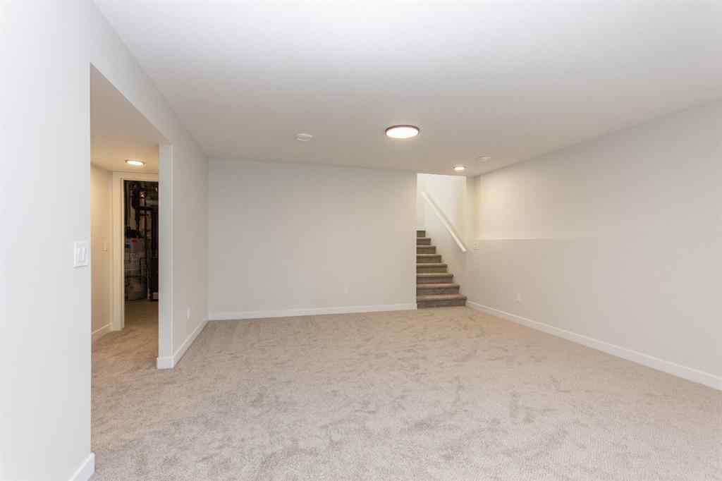 MLS® A2230958 - 52 Trinity Street  in Trinity Crossing Lacombe, Residential