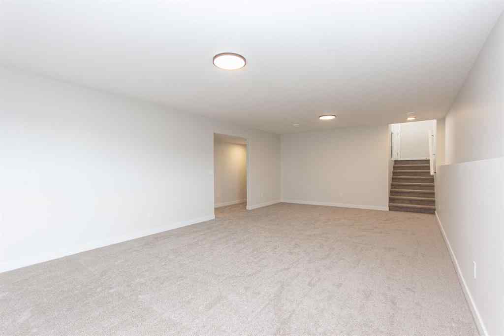 MLS® A2230958 - 52 Trinity Street  in Trinity Crossing Lacombe, Residential