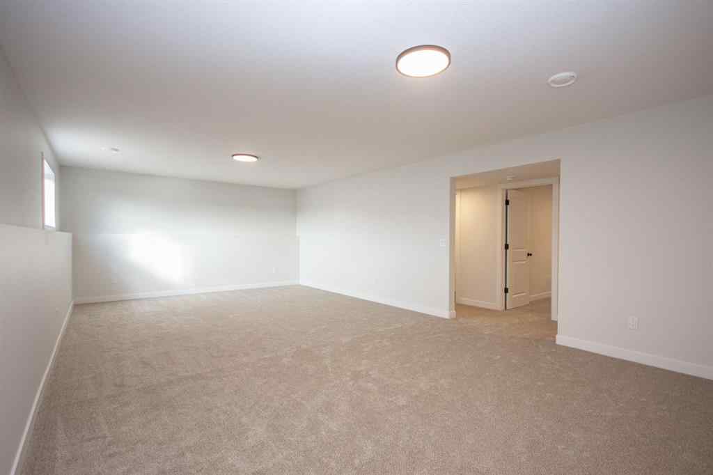 MLS® A2230958 - 52 Trinity Street  in Trinity Crossing Lacombe, Residential