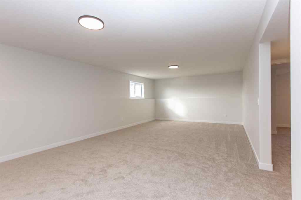 MLS® A2230958 - 52 Trinity Street  in Trinity Crossing Lacombe, Residential