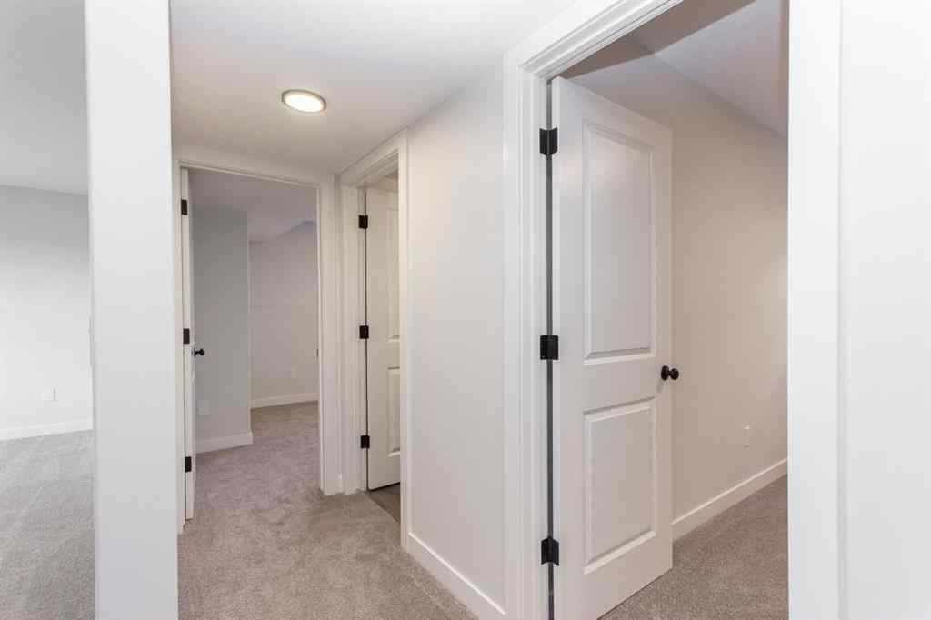 MLS® A2230958 - 52 Trinity Street  in Trinity Crossing Lacombe, Residential