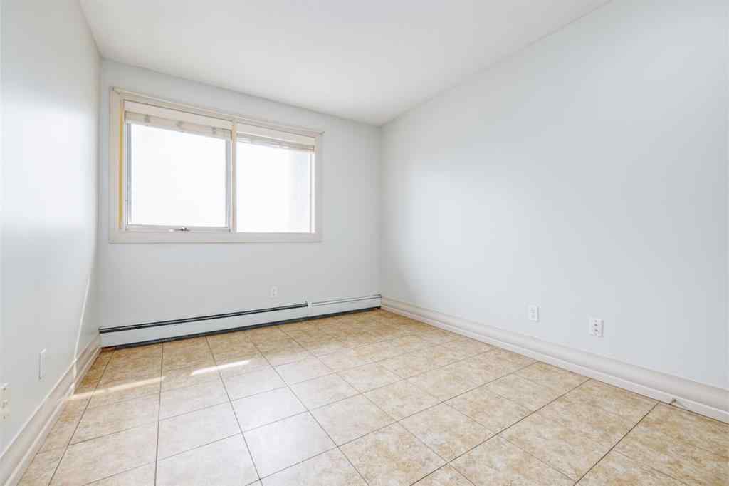 MLS® A2230989 - Unit #7 304 Village Mews SW in Patterson Calgary, Residential