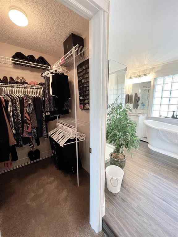 MLS® A2231023 - 24 Evergreen Park Close W in West End Brooks, Residential