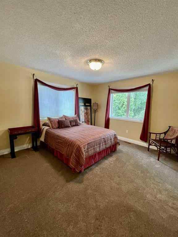 MLS® A2231023 - 24 Evergreen Park Close W in West End Brooks, Residential