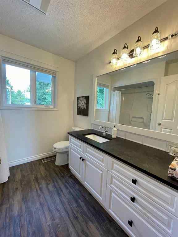MLS® A2231023 - 24 Evergreen Park Close W in West End Brooks, Residential