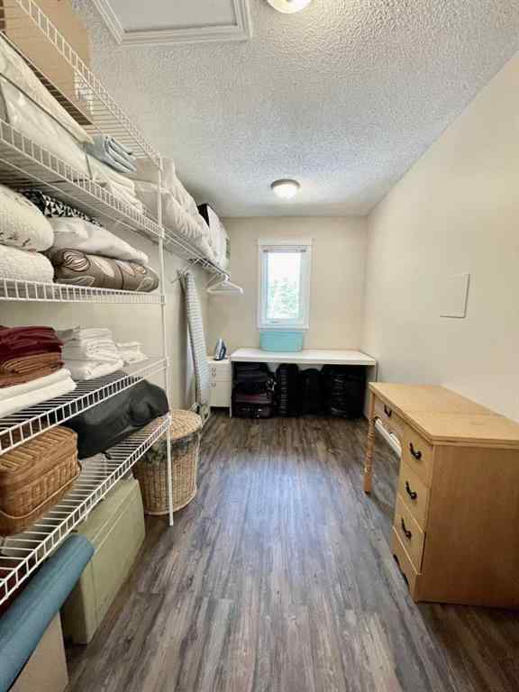 MLS® A2231023 - 24 Evergreen Park Close W in West End Brooks, Residential