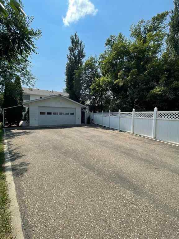 MLS® A2231023 - 24 Evergreen Park Close W in West End Brooks, Residential