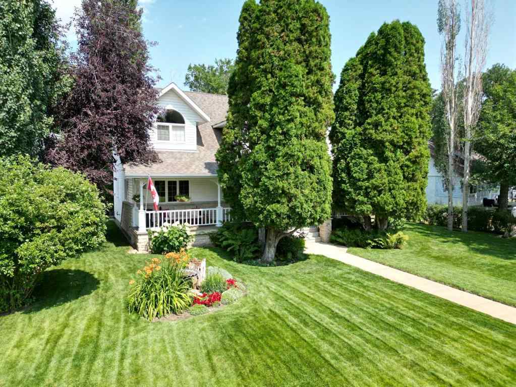 MLS® A2231023 - 24 Evergreen Park Close W in West End Brooks, Residential