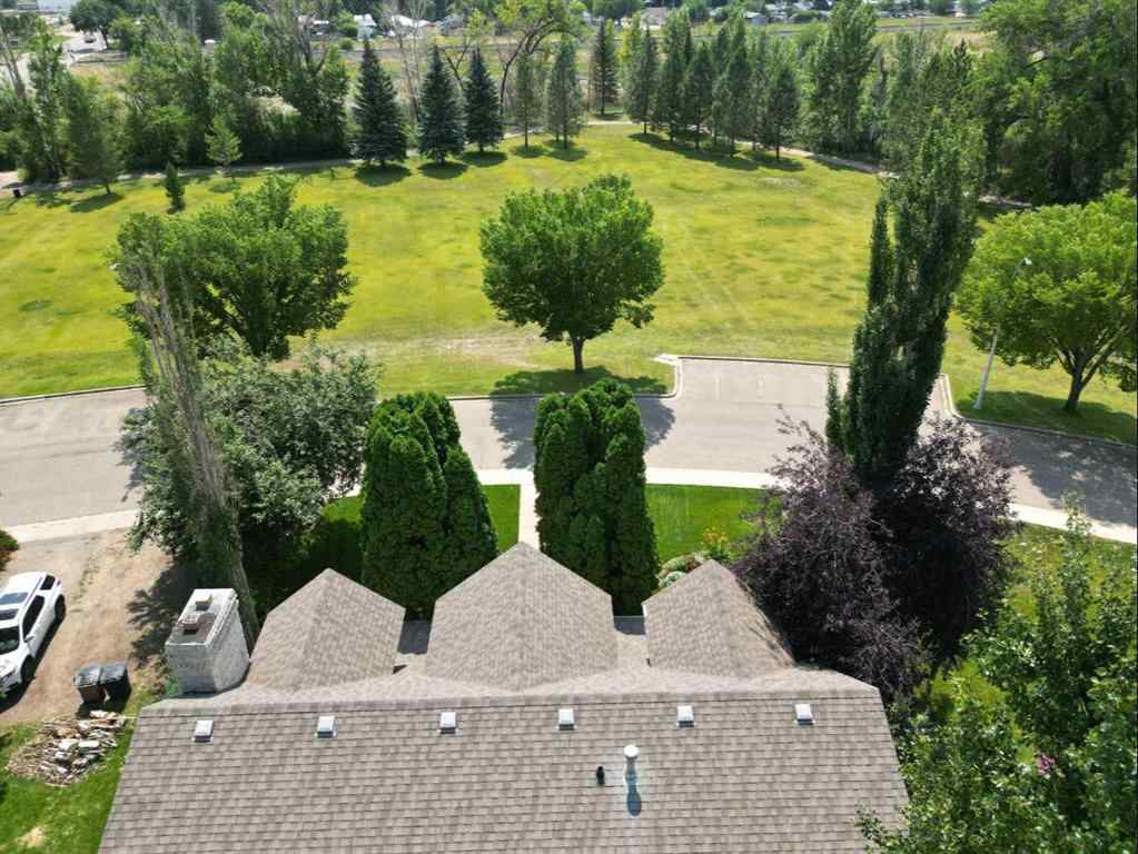 MLS® A2231023 - 24 Evergreen Park Close W in West End Brooks, Residential