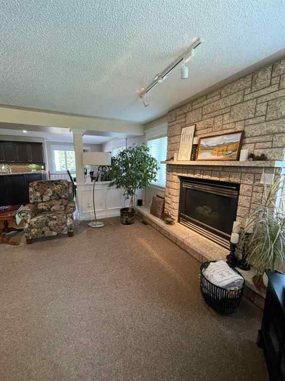 MLS® A2231023 - 24 Evergreen Park Close W in West End Brooks, Residential