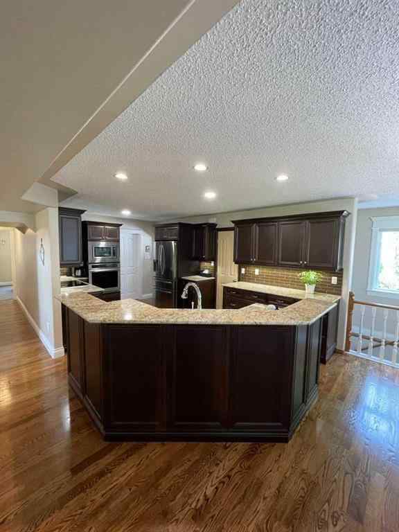 MLS® A2231023 - 24 Evergreen Park Close W in West End Brooks, Residential