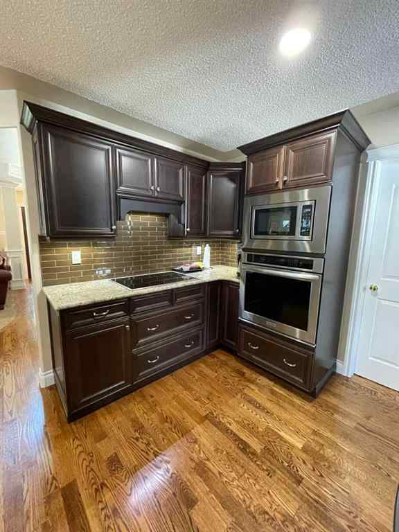 MLS® A2231023 - 24 Evergreen Park Close W in West End Brooks, Residential