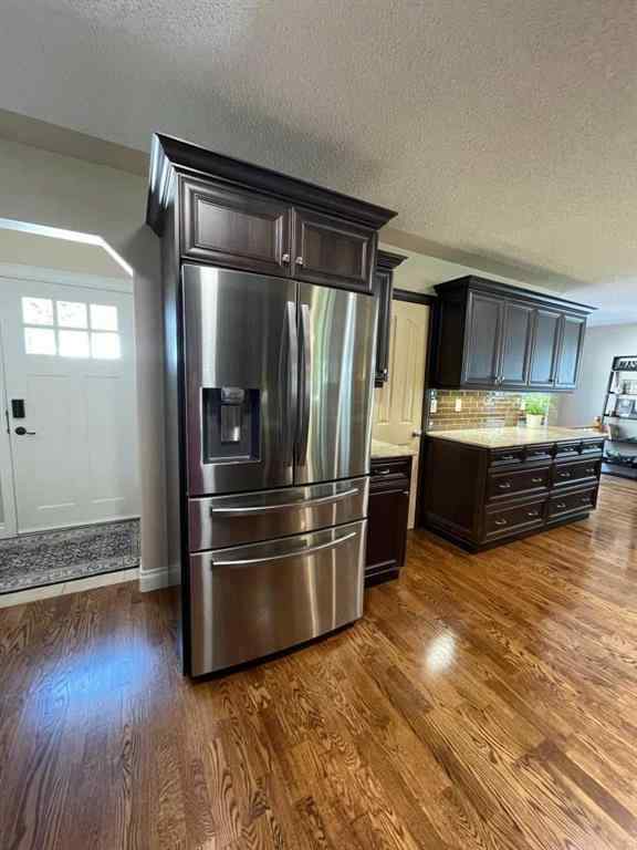 MLS® A2231023 - 24 Evergreen Park Close W in West End Brooks, Residential