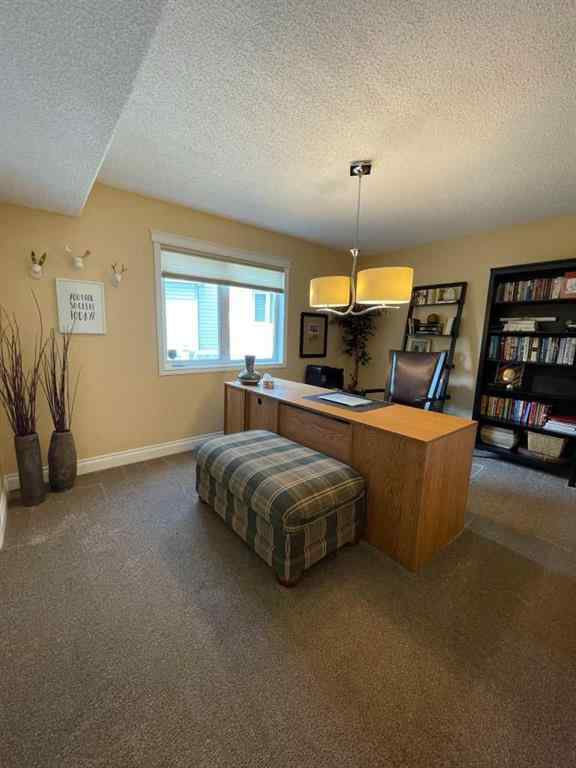 MLS® A2231023 - 24 Evergreen Park Close W in West End Brooks, Residential