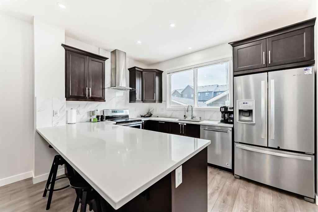 MLS® A2231050 - 59 Belmont Gardens SW in Belmont Calgary, Residential