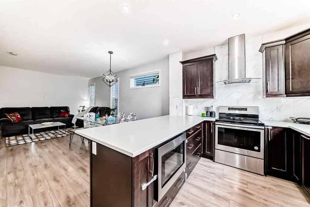 MLS® A2231050 - 59 Belmont Gardens SW in Belmont Calgary, Residential