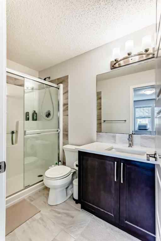 MLS® A2231050 - 59 Belmont Gardens SW in Belmont Calgary, Residential