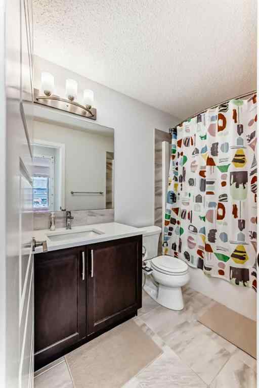 MLS® A2231050 - 59 Belmont Gardens SW in Belmont Calgary, Residential