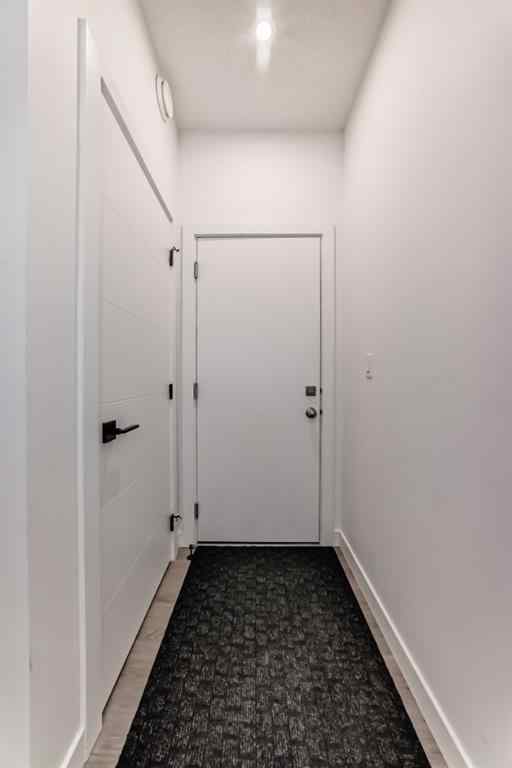 MLS® A2231062 - Unit #129 2117 81 Street SW in Springbank Hill Calgary, Residential
