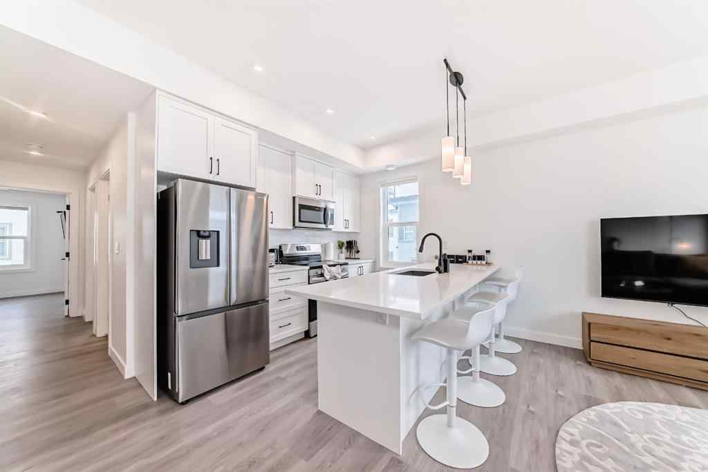 MLS® A2231062 - Unit #129 2117 81 Street SW in Springbank Hill Calgary, Residential
