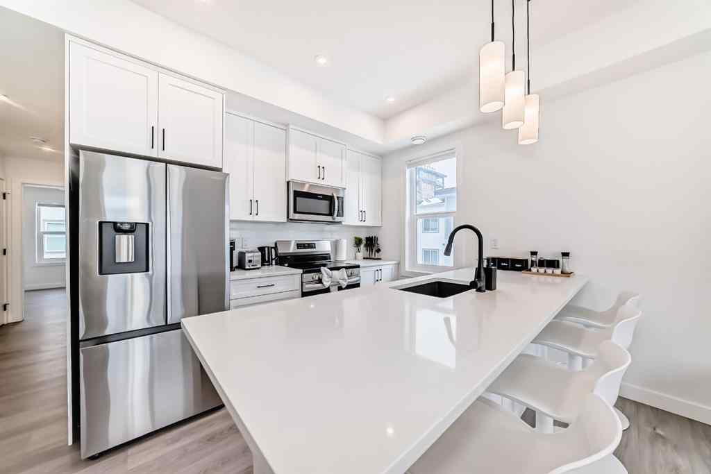 MLS® A2231062 - Unit #129 2117 81 Street SW in Springbank Hill Calgary, Residential