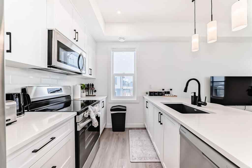 MLS® A2231062 - Unit #129 2117 81 Street SW in Springbank Hill Calgary, Residential