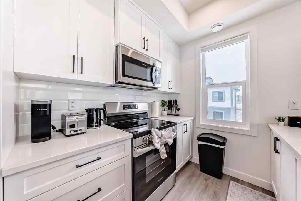 MLS® A2231062 - Unit #129 2117 81 Street SW in Springbank Hill Calgary, Residential