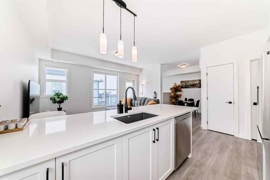 MLS® A2231062 - Unit #129 2117 81 Street SW in Springbank Hill Calgary, Residential