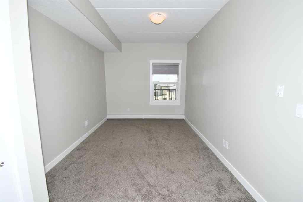 MLS® A2231086 - Unit #306 499 Meadow Lake Court E in Meadowbrook Brooks, Residential