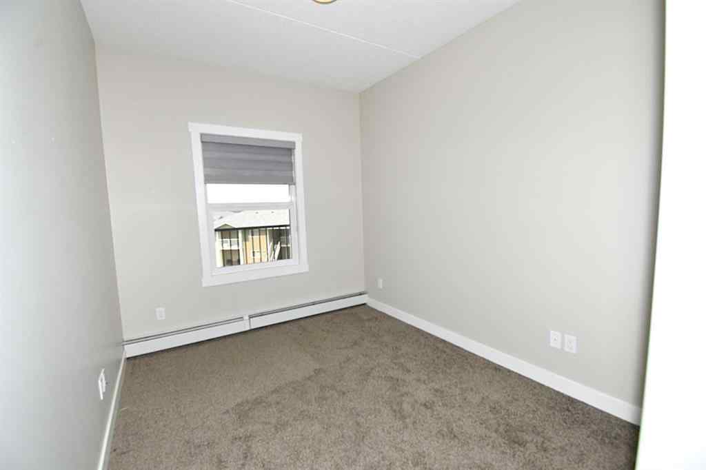 MLS® A2231086 - Unit #306 499 Meadow Lake Court E in Meadowbrook Brooks, Residential