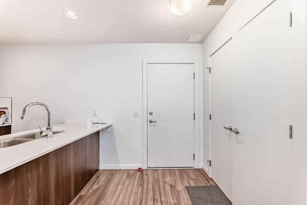 MLS® A2231094 - Unit #106 1629 38 Street SW in Rosscarrock Calgary, Residential