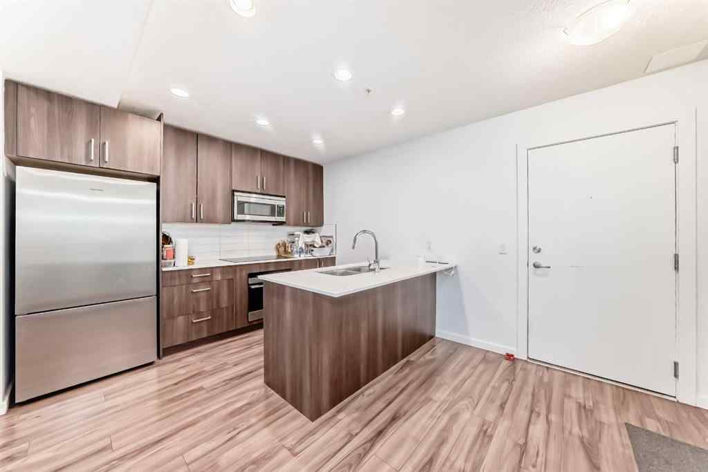 MLS® A2231094 - Unit #106 1629 38 Street SW in Rosscarrock Calgary, Residential