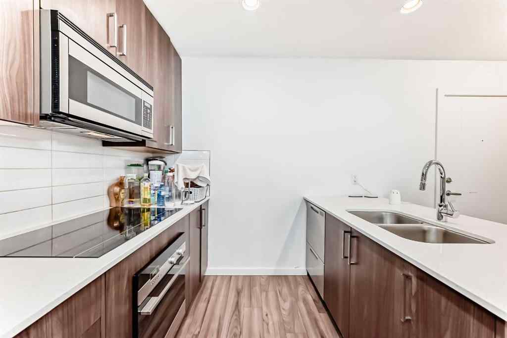 MLS® A2231094 - Unit #106 1629 38 Street SW in Rosscarrock Calgary, Residential