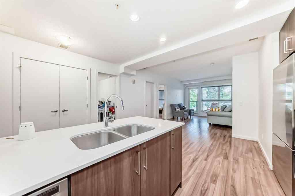 MLS® A2231094 - Unit #106 1629 38 Street SW in Rosscarrock Calgary, Residential