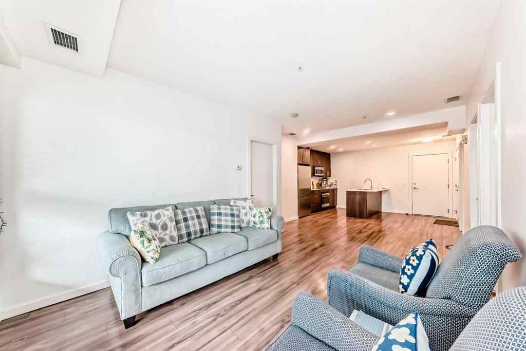 MLS® A2231094 - Unit #106 1629 38 Street SW in Rosscarrock Calgary, Residential