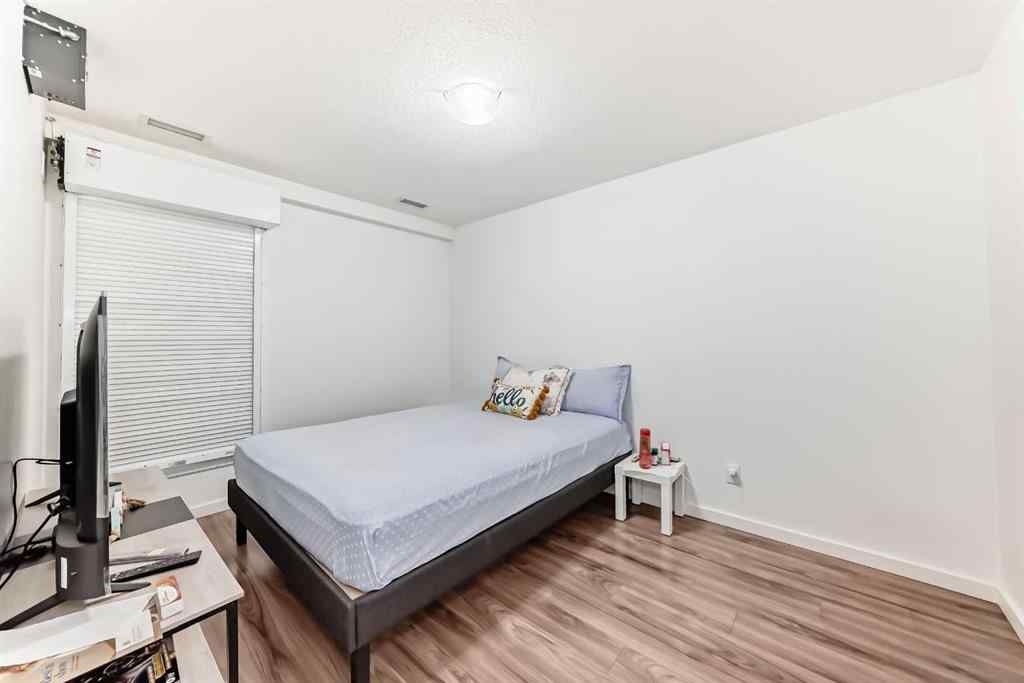 MLS® A2231094 - Unit #106 1629 38 Street SW in Rosscarrock Calgary, Residential