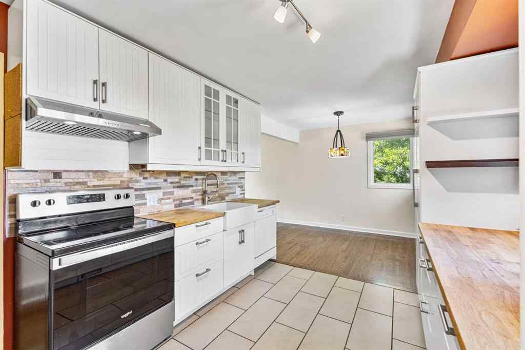 MLS® A2231220 - 424 Blackthorn Road NW in Thorncliffe Calgary, Residential