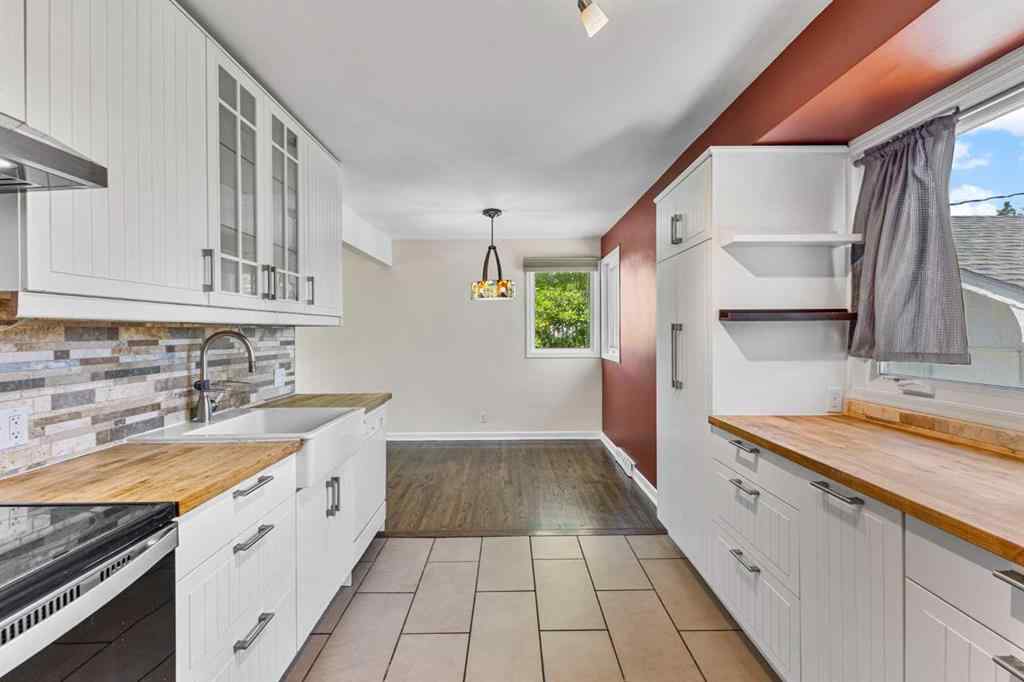 MLS® A2231220 - 424 Blackthorn Road NW in Thorncliffe Calgary, Residential