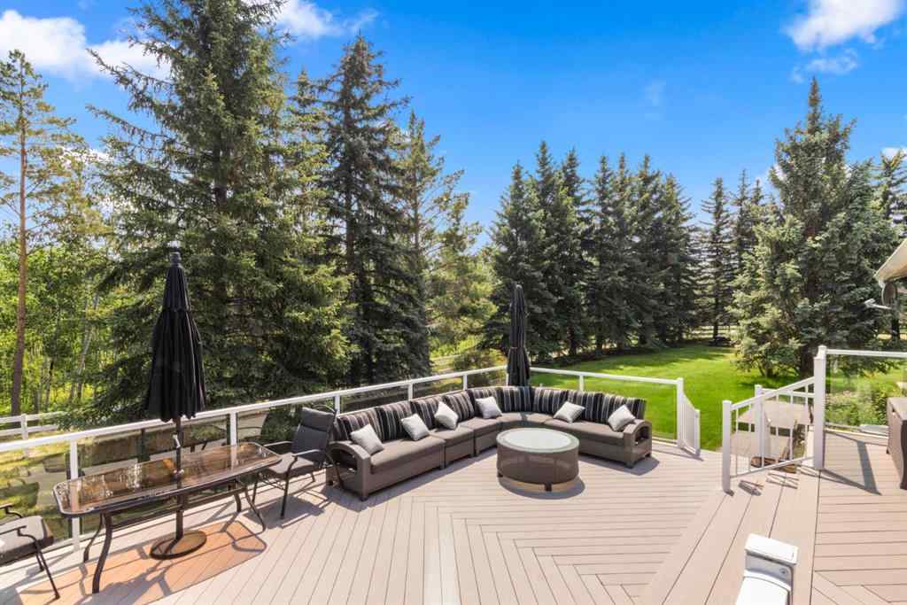 MLS® A2231227 - 242042 36 Street E in Carmoney Estates Rural Foothills County, Residential