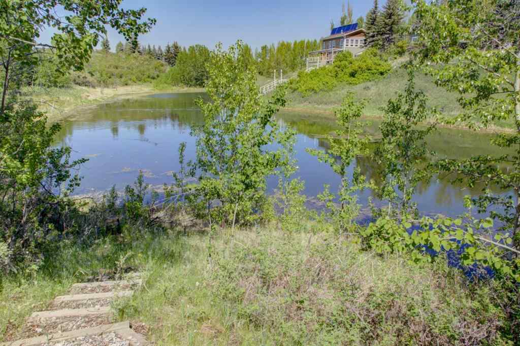 MLS® A2231227 - 242042 36 Street E in Carmoney Estates Rural Foothills County, Residential