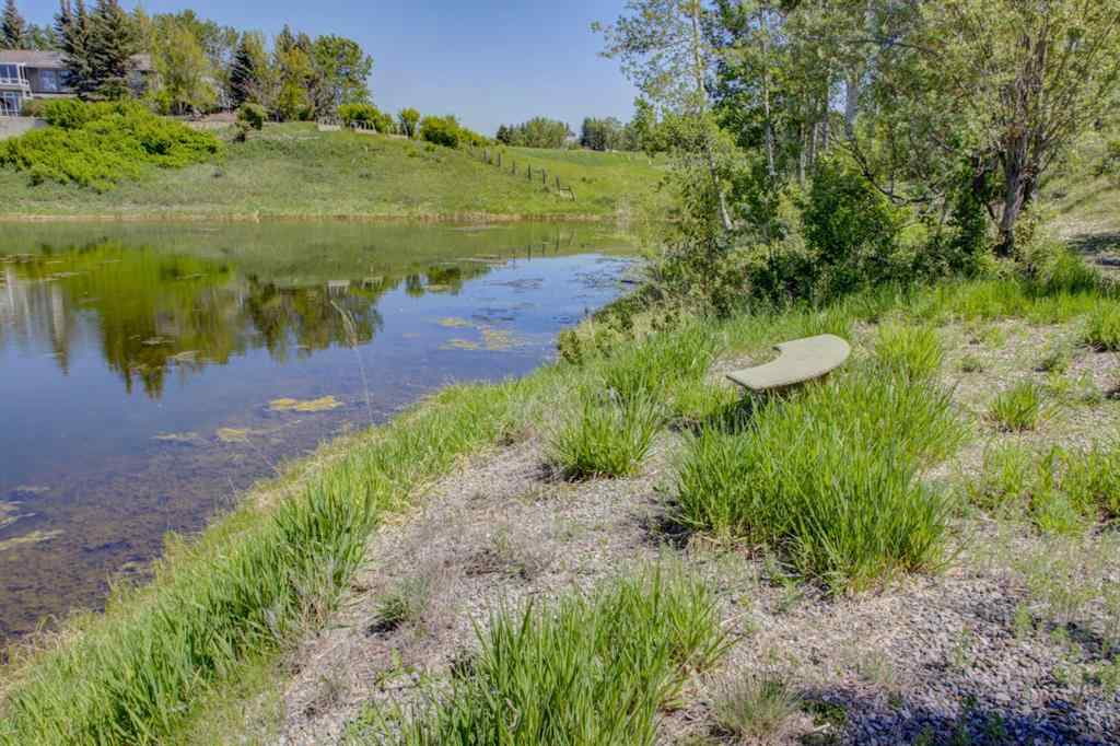 MLS® A2231227 - 242042 36 Street E in Carmoney Estates Rural Foothills County, Residential