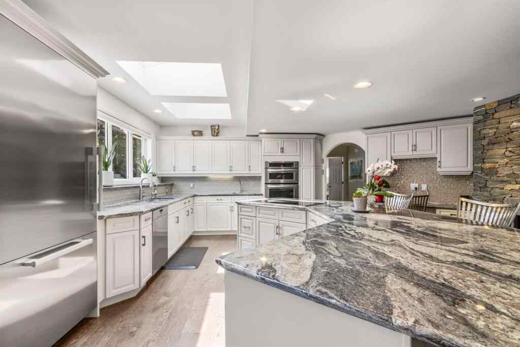 MLS® A2231227 - 242042 36 Street E in Carmoney Estates Rural Foothills County, Residential