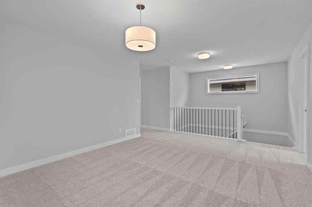 MLS® A2231344 - 1309 South Point Parade SW in South Point Airdrie, Residential