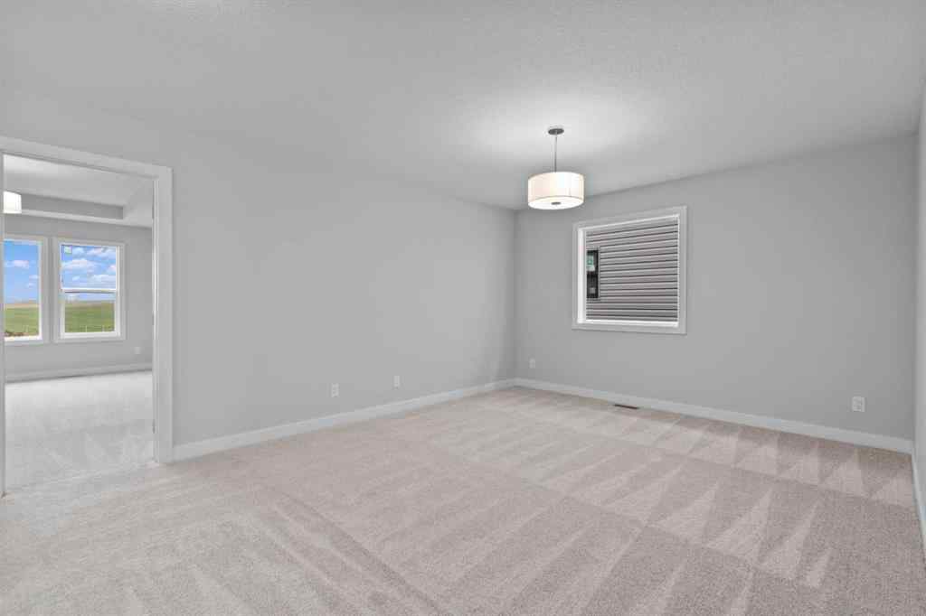 MLS® A2231344 - 1309 South Point Parade SW in South Point Airdrie, Residential