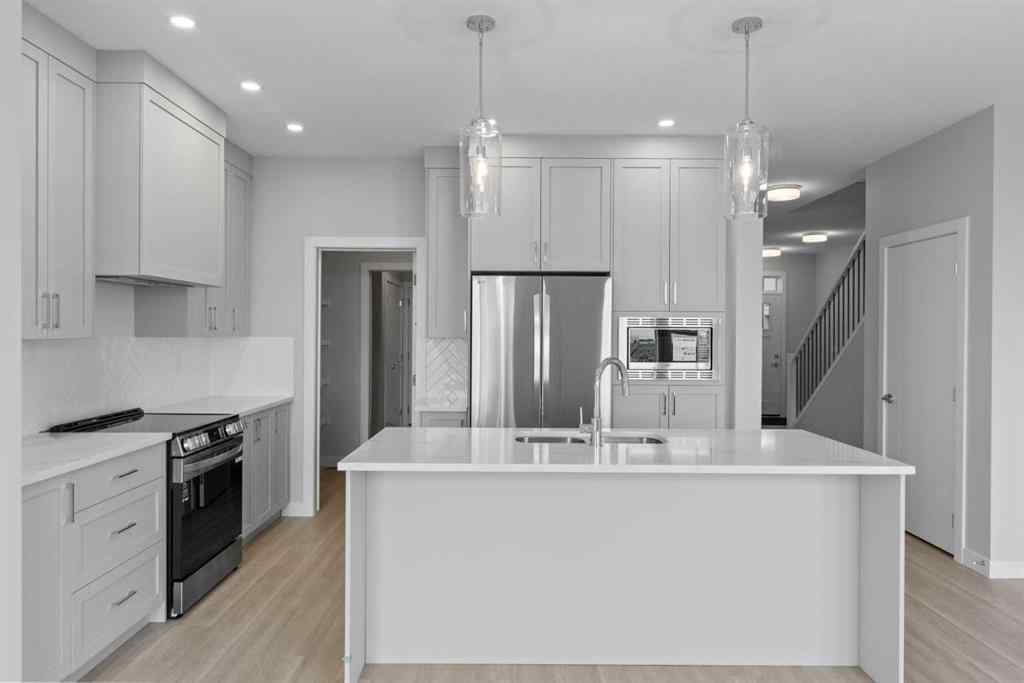MLS® A2231344 - 1309 South Point Parade SW in South Point Airdrie, Residential