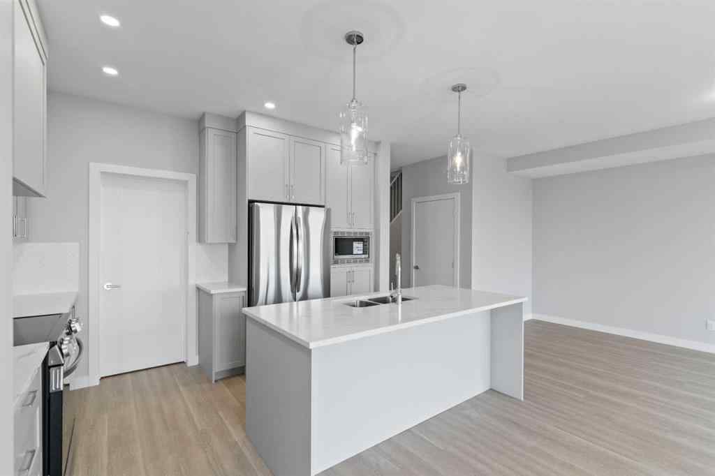 MLS® A2231344 - 1309 South Point Parade SW in South Point Airdrie, Residential