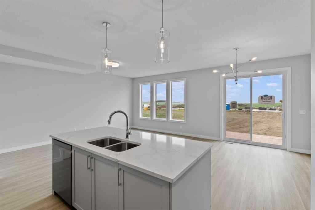 MLS® A2231344 - 1309 South Point Parade SW in South Point Airdrie, Residential