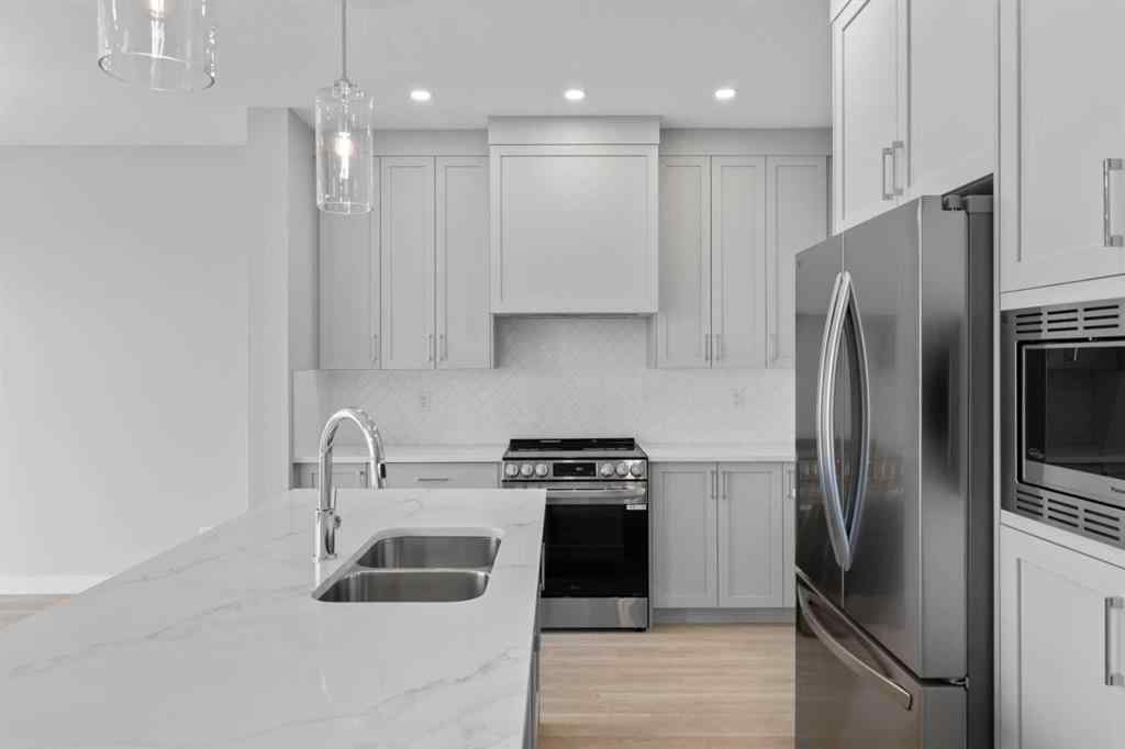 MLS® A2231344 - 1309 South Point Parade SW in South Point Airdrie, Residential